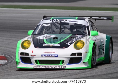 SEPANG - JUNE 17: Sasha Chu (11) from the Asia Racing Team in a Porsche takes to the tracks of the Sepang International Circuit at the GT Asia Series race on June 17, 2011 in Sepang, Malaysia.