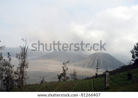 JAVA, INDONESIA - JULY 1: Mount Bromo erupts spewing out ash and smoke on July 1, 2011 in Java, Indonesia. Indonesia sits on the \'ring of fire\' with many active volcanoes and prone to earthquakes.