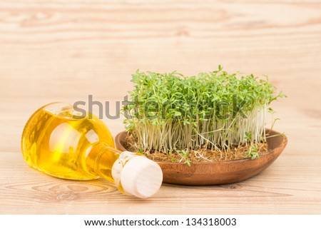 Fresh green watercress on a  wooden backgrounds