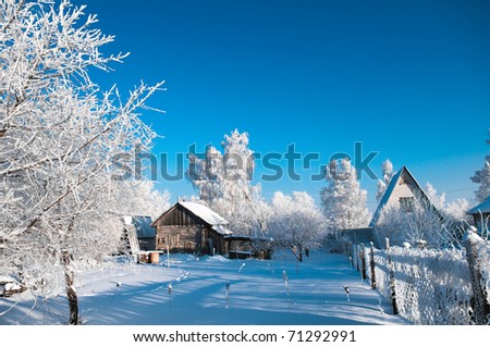 Old village house in cold winter day