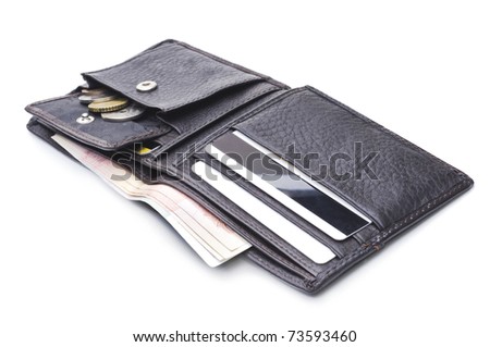 Open brown leather wallet with money