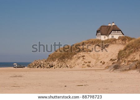 Single house an a hill at the beach.