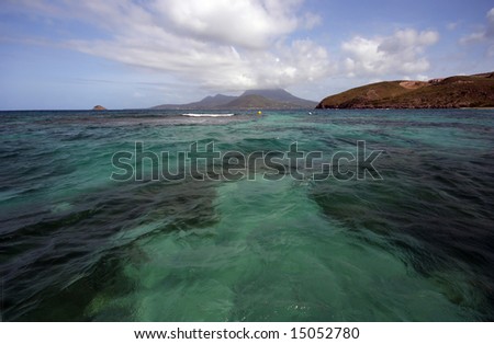 Nevis and St. Kitts, as seen from a dock on Nevis in the West Indies.