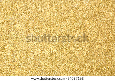 Grains of gold sand lay roughly