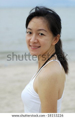 Chinese Lady At Beach