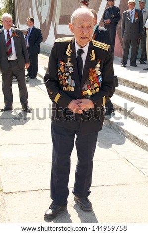 KALININGRAD, RUSSIA - MAY 07: veteran of the World War II with his medals walked at street on during the victory celebration in World War II on May 07, 2013 in Kaliningrad, Russia