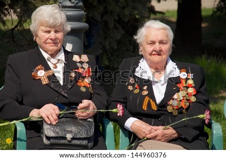 KALININGRAD, RUSSIA - MAY 07:  seniors women veterans of the World War II with their medals at street on during the victory celebration in World War II on May 07, 2013 in Kaliningrad, Russia