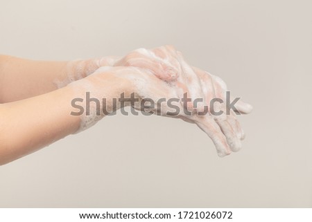 Similar – Image, Stock Photo unrecognizable woman washing hands on a sink with soap. Coronavirus covid-19 concept