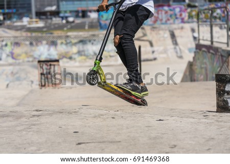 Similar – Image, Stock Photo Riding scooter in skate park