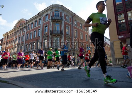 Stockholm, Sweden - September 14: Marathon runners at Stockholm Half Marathon on September 14, 2013 in Stockholm.