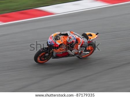SEPANG,MALAYSIA-OCT.21:Casey Stoner of Repsol Honda in action during practice session of Shell Advance Malaysian Moto GrandPrix on Oct. 21 2011 in Sepang, Malaysia.