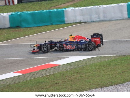 SEPANG, MALAYSIA - MARCH 23: Australian Mark Webber of Red Bull Racing-Renault in action during Friday practice at Petronas Formula 1 Grand Prix on March 23, 2012 in Sepang, Malaysia