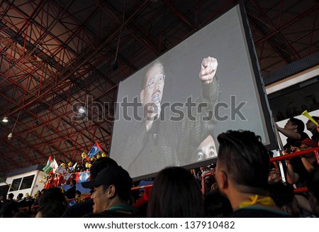 PETALING JAYA, MALAYSIA - MAY 8: Chua Jui Meng on a projector screen at a political rally against Malaysia 13th general election vote result on May 8, 2013 in Stadium MBPJ, Petaling Jaya, Malaysia.