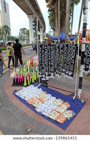 PETALING JAYA, MALAYSIA - MAY 25: Vendor with protest memento at a youth protest rally against Malaysia 13th general election vote result on May 25, 2013 in Padang Timur, Petaling Jaya, Malaysia.