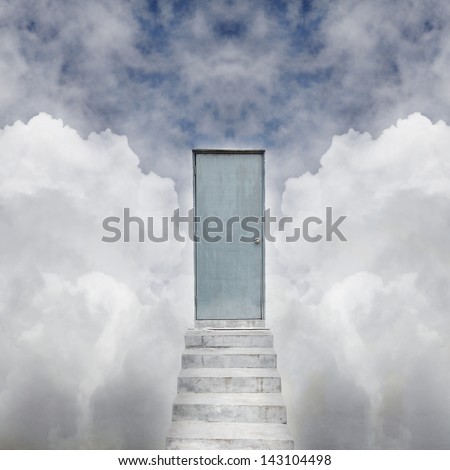 Concrete stairway leading to a timber door entrance in a surreal cloudy sky.