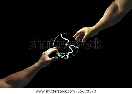 A composed image of two arm extending out to touch a ball of electric charge.