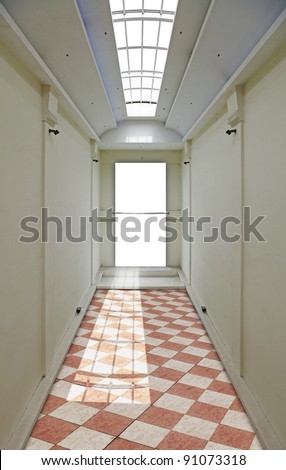 An empty display board with space for text at the end of an exhibition hallway with checkers floors and an open skylight.