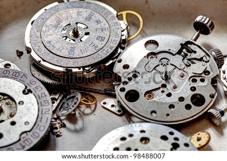 Closeup image of a disassembled innards of old watches. This is a HDR image.