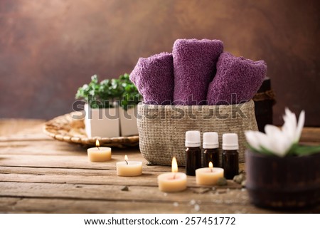 Spa and wellness setting with flowers and towels. Dayspa nature products
