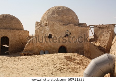 SAHARA, TUNISIA - OCT 18: Abandoned sets for the shooting of the movie Star Wars in the Sahara desert on a background of sand dunes on October 18, 2008 in Sahara, Tunisia