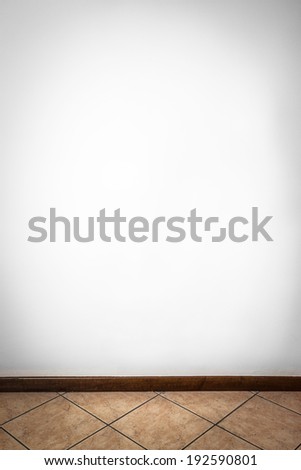Empty room with white wall and concrete floor vertical composition