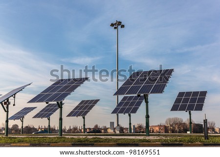 solar panel in the middle of land on sky and building background