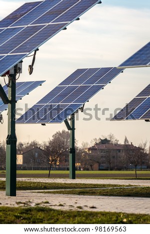 solar panel in the middle of land on sky and building background