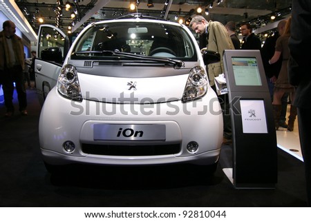 BRUSSELS, BELGIUM - JANUARY 15: Peugeot iOn electric car shown at Euro Motors 2012 exhibition on January 15, 2012 in Brussels, Belgium