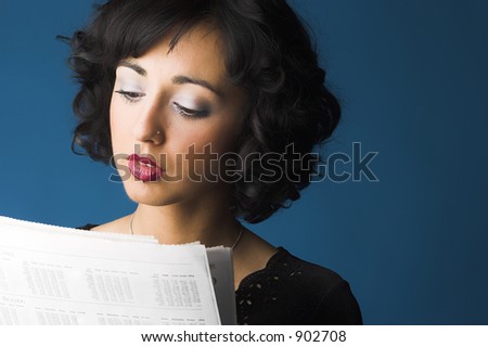 Brunette Model reading paper