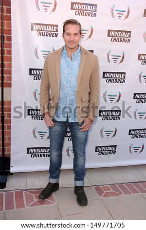 LOS ANGELES - AUG 10:  Ryan Hansen at the Invisible Children Fourth Estate\'s Founders Party at the UCLA on August 10, 2013 in Westwood, CA
