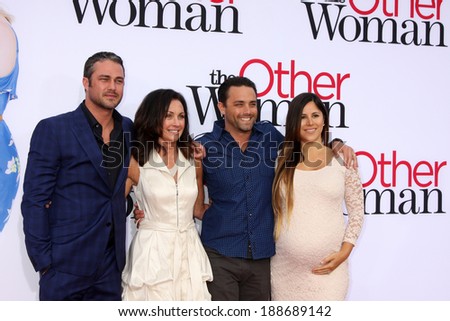 LOS ANGELES - APR 21:  Taylor Kinney, mother Pamela Heisler, and Brother and Sister in Law at the \