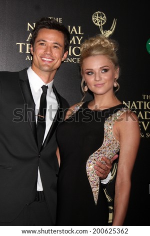 LOS ANGELES - JUN 22:  Matthew Atkinson, Hunter King at the 2014 Daytime Emmy Awards Arrivals at the Beverly Hilton Hotel on June 22, 2014 in Beverly Hills, CA