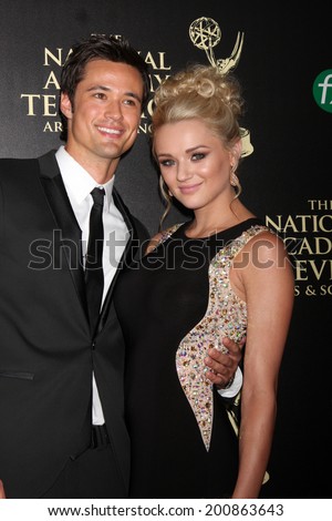 LOS ANGELES - JUN 22:  Matthew Atkinson, Hunter King at the 2014 Daytime Emmy Awards Arrivals at the Beverly Hilton Hotel on June 22, 2014 in Beverly Hills, CA
