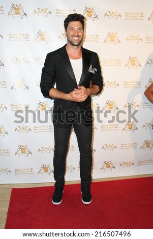 LOS ANGELES - SEP 10:  Maks Chmerkovskiy at the Dance With Me USA Grand Opening at Dance With Me Studio on September 10, 2014 in Sherman Oaks, CA