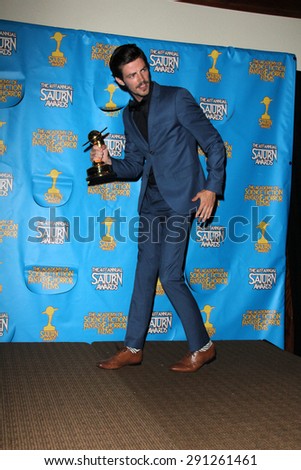 LOS ANGELES - JUN 25:  Grant Gustin at the 41st Annual Saturn Awards Press Room at the The Castaways on June 25, 2015 in Burbank, CA