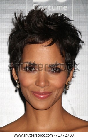 LOS ANGELES - FEB 22:  Halle Berry arrives at the 13th Annual Costume Designers Guild Awards at Beverly Hilton Hotel on February 22, 2011 in Beverly Hills, CA