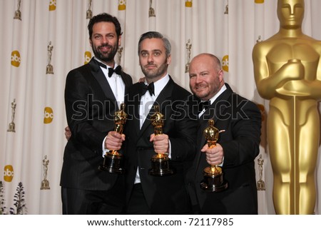 LOS ANGELES -  27:   Emile Sherman, Iain Canning, and Gareth Unwin,  in the Press Room at the 83rd Academy Awards at Kodak Theater, Hollywood & Highland on February 27, 2011 in Los Angeles, CA