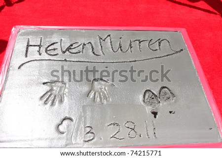 LOS ANGELES - MAR 28:  Helen Mirren Handprints and Footprints at the Helen Mirren Handprints and Footprints Ceremony  at Graumans Chinese Theater on March 28, 2010 in Los Angeles, CA.