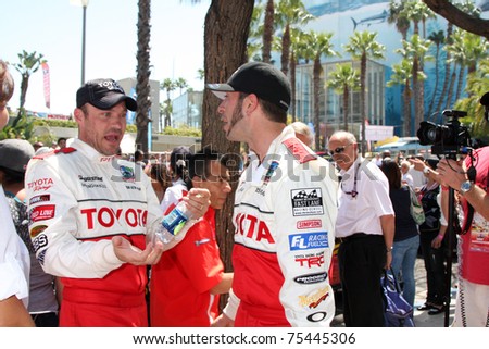 LOS ANGELES - APR 16:  Brian Austin Green, Chris Rado attend the Toyota Grand Prix Pro Celeb Race at the Toyota Grand Prix Track on April 16, 2011 in Long Beach, CA.