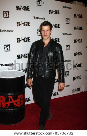 LOS ANGELES - SEPT 30:  Eric Mabius arriving at  the RAGE Game Launch at the Chinatown\'s Historical Central Plaza on September 30, 2011 in Los Angeles, CA