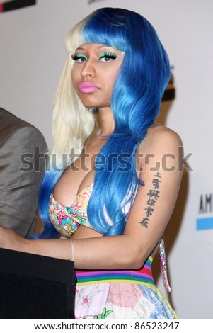 LOS ANGELES - OCT 11:  Nicki Minaj arriving at the 2011 American Music Awards Nominations Press Conference  at the JW Marriott Los Angeles at L.A. LIVE on October 11, 2011 in Los Angeles, CA