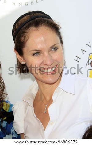 LOS ANGELES - MAR 4:  Amy Brenneman arrives at the  Have A Dream Foundation\'s 14th Annual Dreamers Brunch at the Skirball Cultural Center on March 4, 2012 in Los Angeles, CA