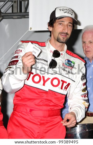 LOS ANGELES - APR 3:  Adrien Brody at the 2012 Toyota Pro/Celeb Race Press Day at Toyota Long Beach Grand Prix Track on April 3, 2012 in Long Beach, CA