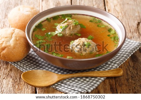 Similar – Image, Stock Photo Bavarian liver dumpling soup on wood