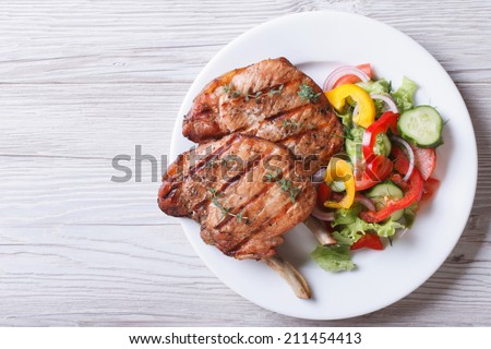 Similar – Image, Stock Photo Fresh cooked food in baking dish with various ingredients. Kitchen equipment. Dark concrete background.Flat lay. Top view