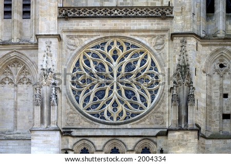 Similar – Image, Stock Photo Rose window and sculpted filigrees at the front of a gothic cathedral