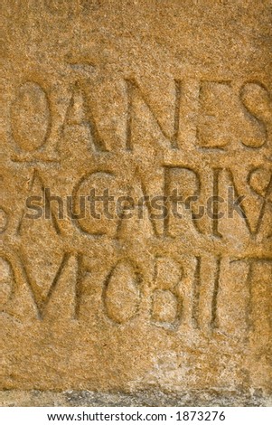 Letters carved in stone in Sarlat, Dordogne, France