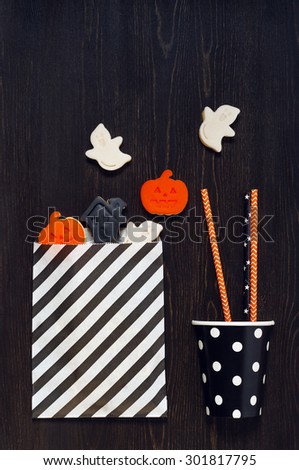 Cookies for Halloween party on the wooden black table