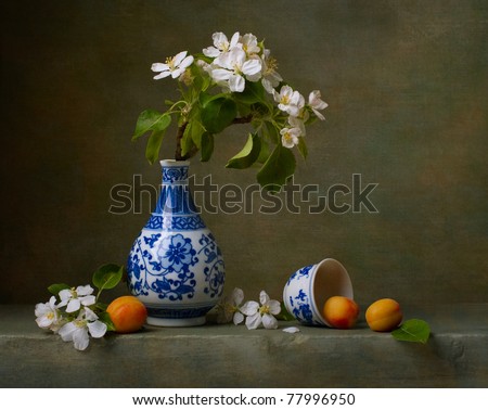 Still life with flowers of apple and apricots