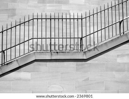 Empty Outdoor Stairs With Metal Railings On A Brick Wall, Black And White